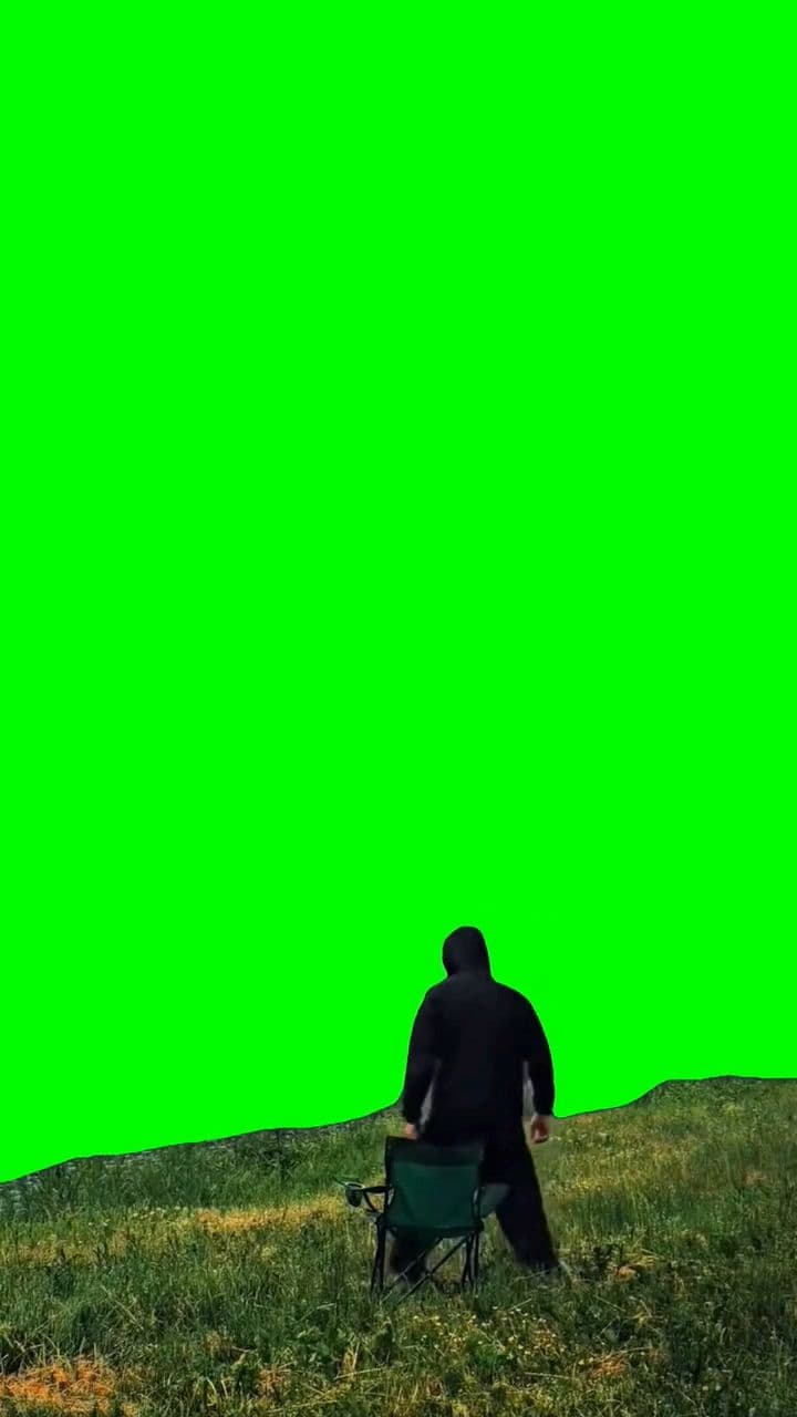 Man sitting in nature green screen meme template
